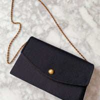 Black Fabric and Faux Pearl Bag