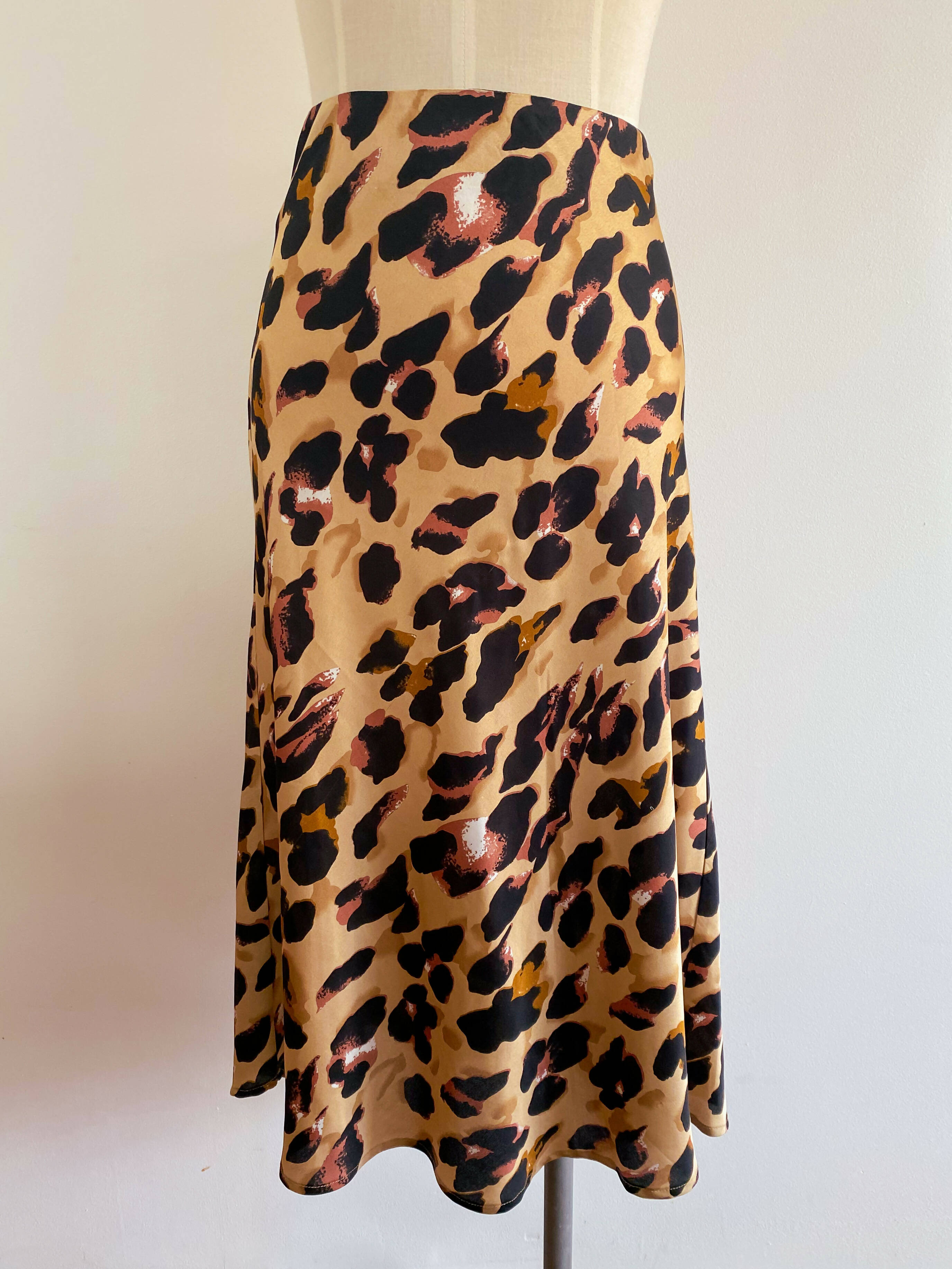 Cotton candy la 2025 leopard print midi skirt